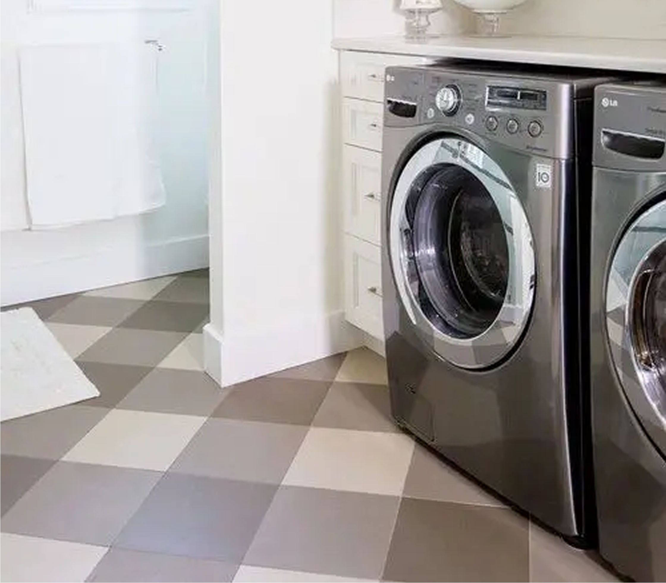 Modern laundry room with washer and dryer.
