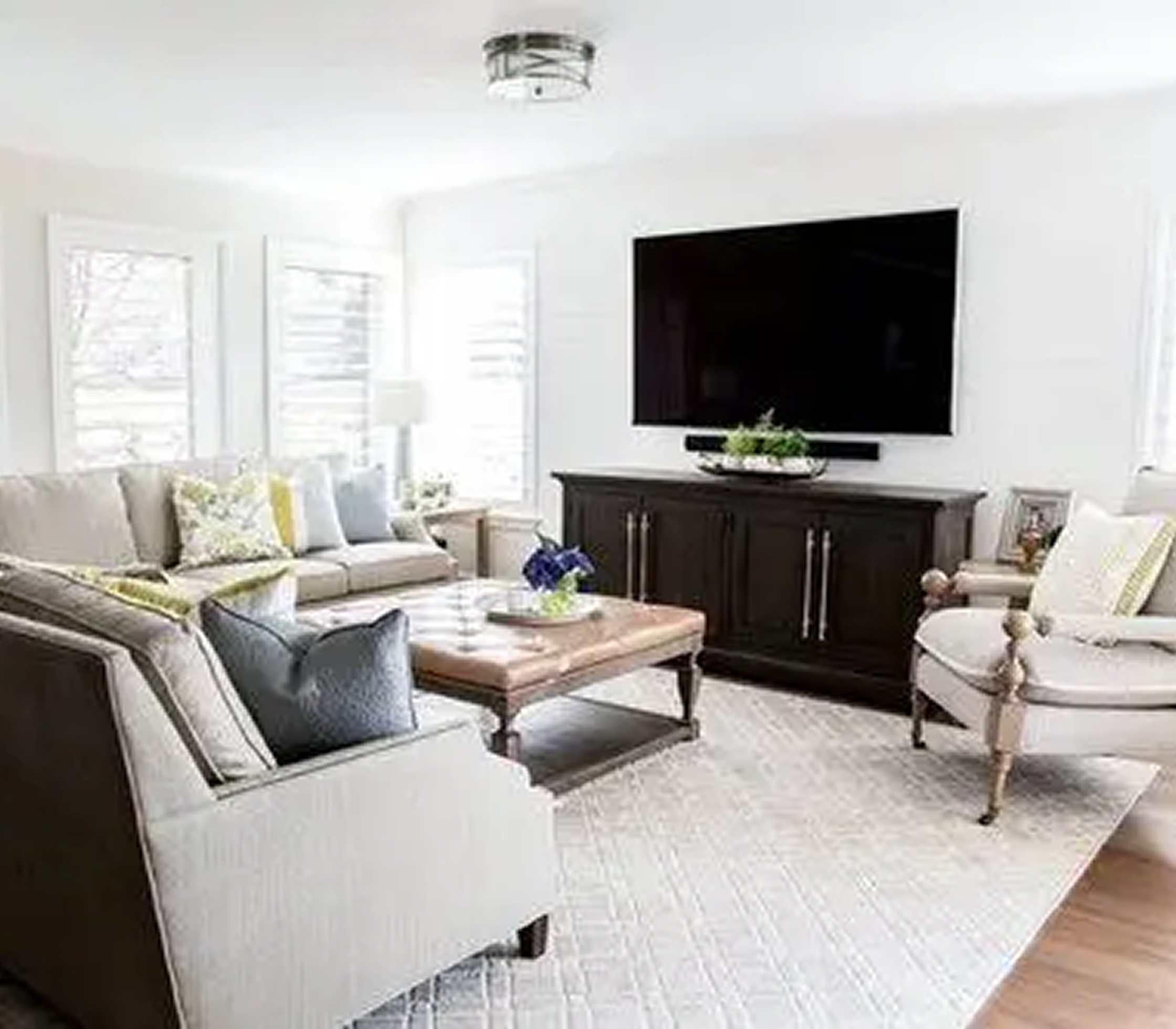 Modern living room with cozy furniture arrangement.