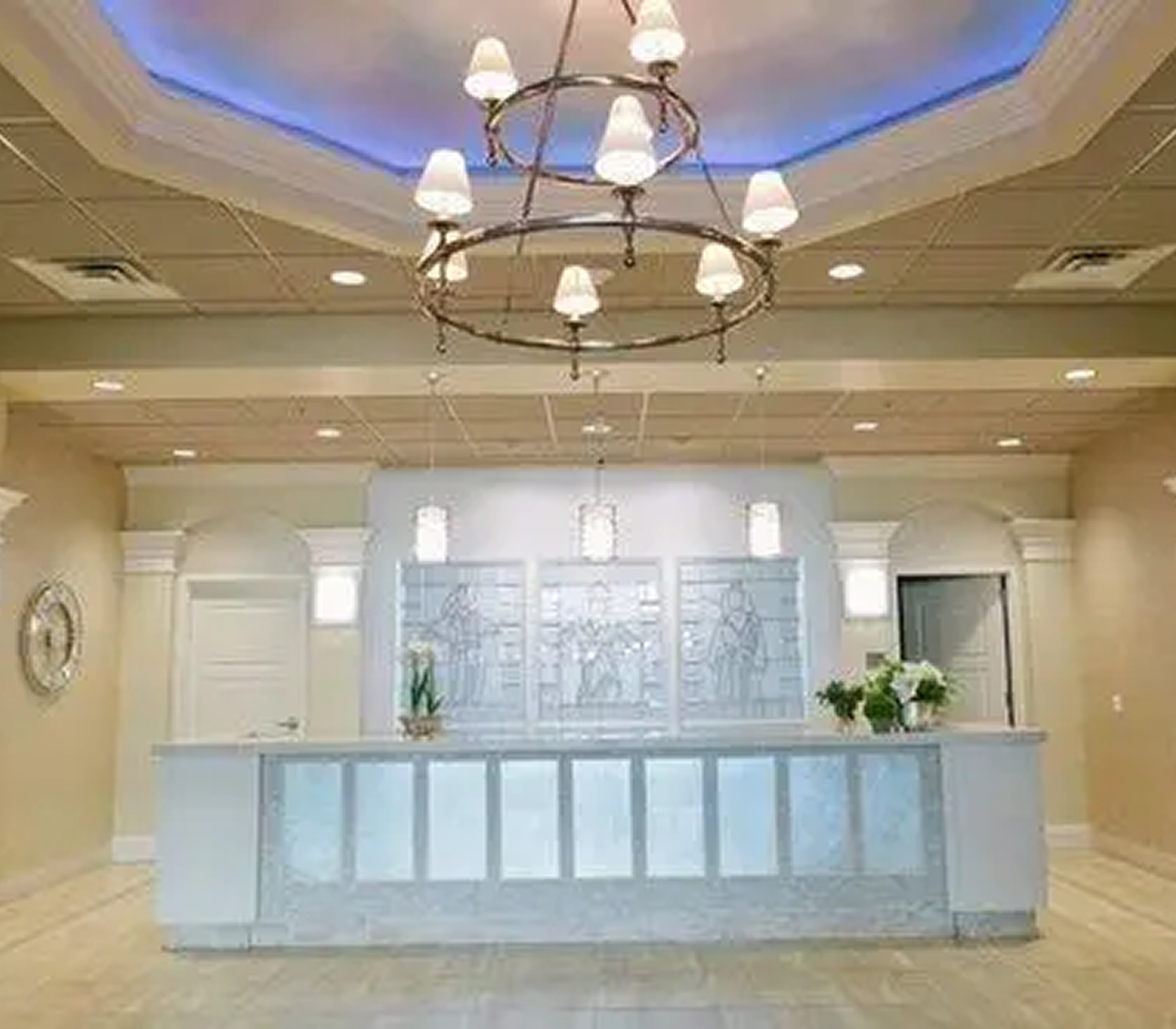 Elegant reception area with chandelier lighting.