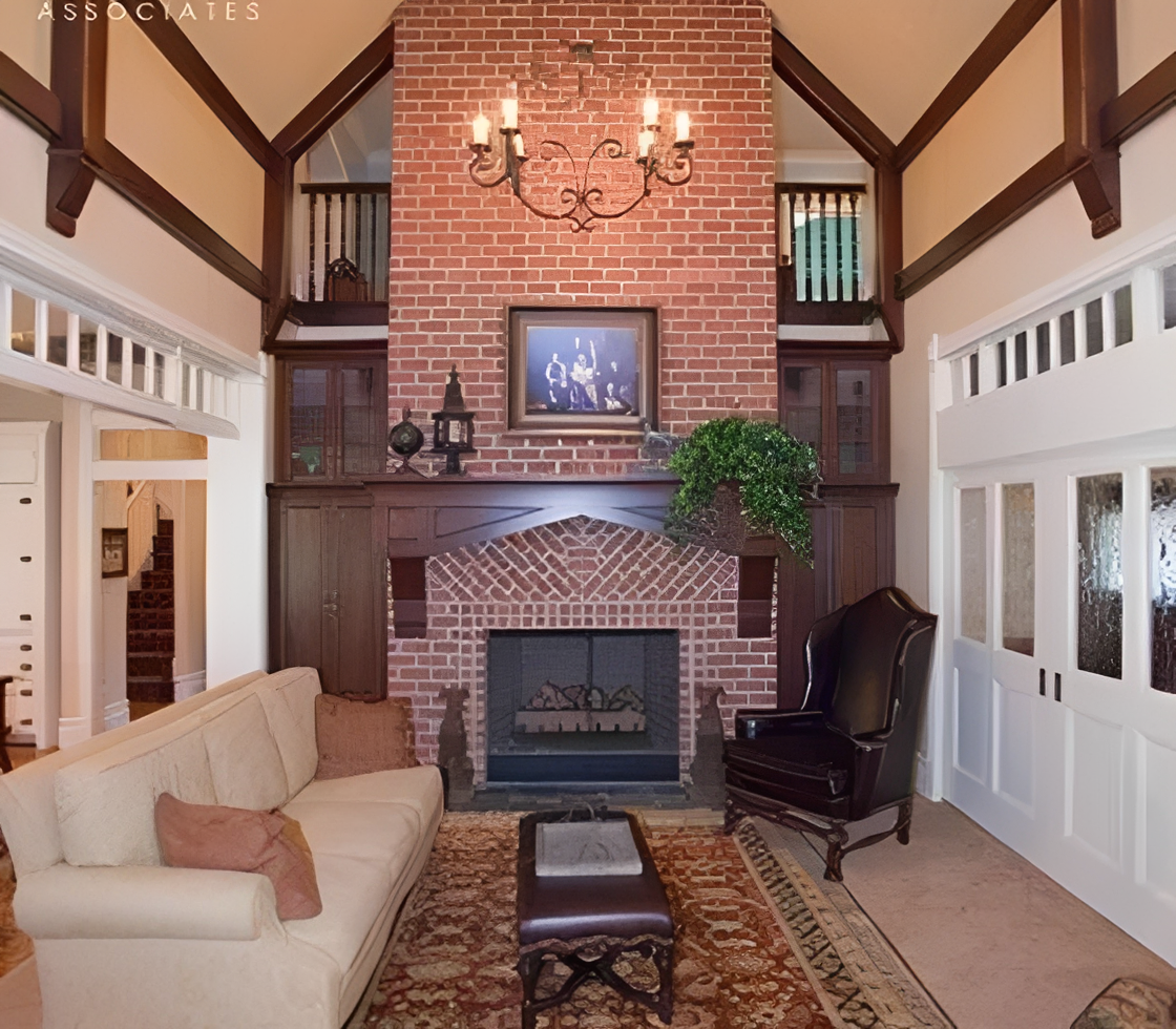 Elegant living room with brick fireplace.